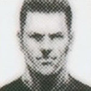 Retrato de un recluta de Mother Base, de pelo corto y oscuro